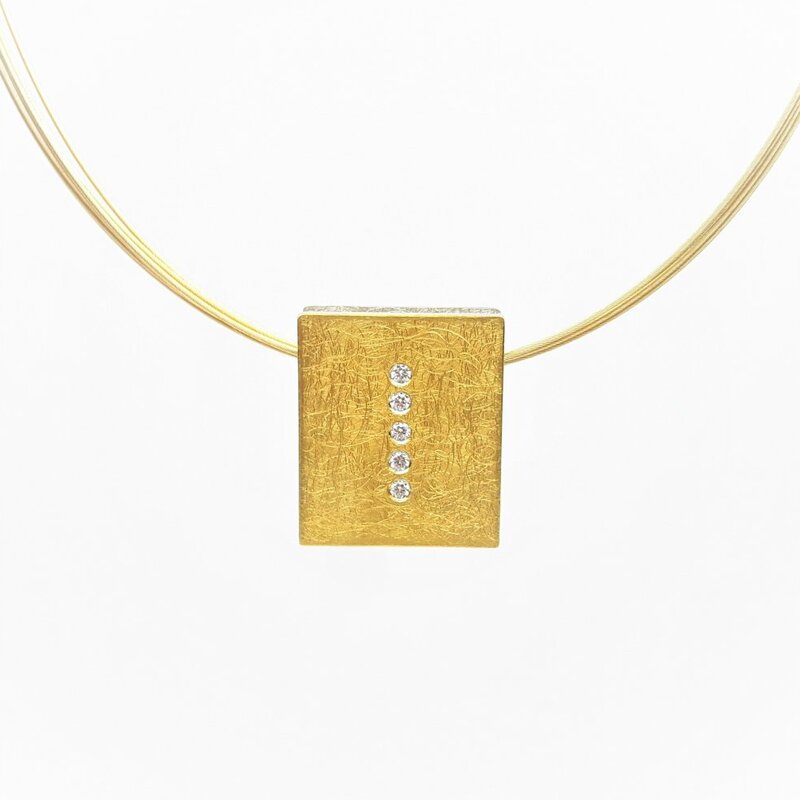 Pendentif en or fin, argent 925/- et 5 brillants.