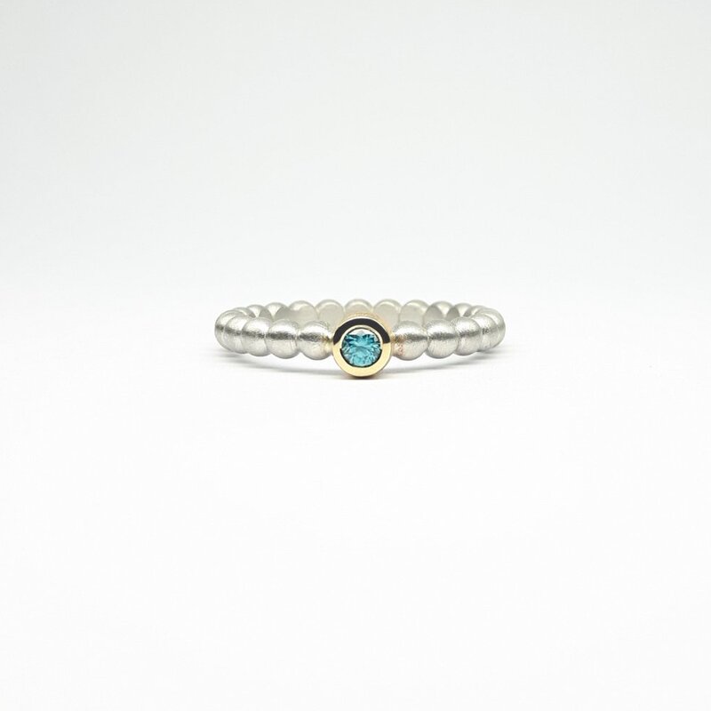"round around", bague boules en argent 925/-, or jaune 18kt et zircon bleu.