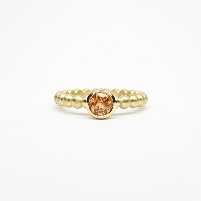"round around", bague boules en or jaune 18kt et grenat mandarin Ø5mm.