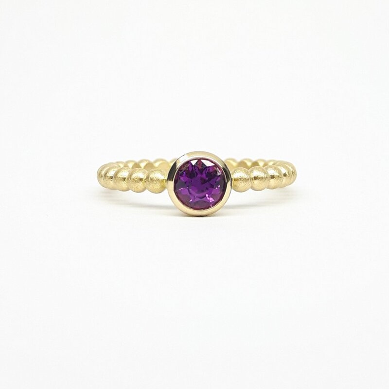 "round around", bague boules en or jaune 18kt et grenat pourpre Ø5mm.