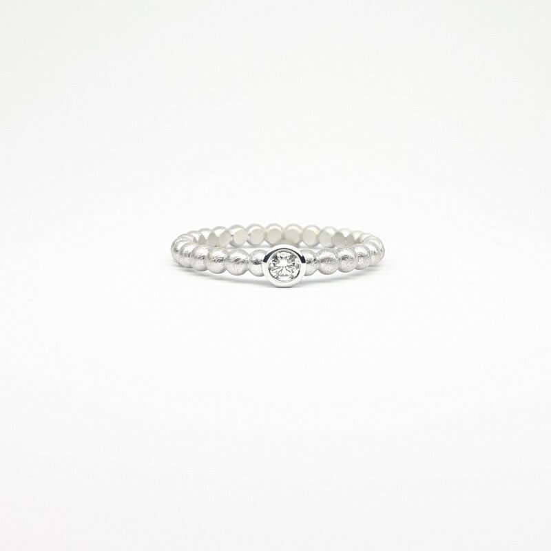 "round around", bague boules en or jaune 18kt et diamant 0,10ct.