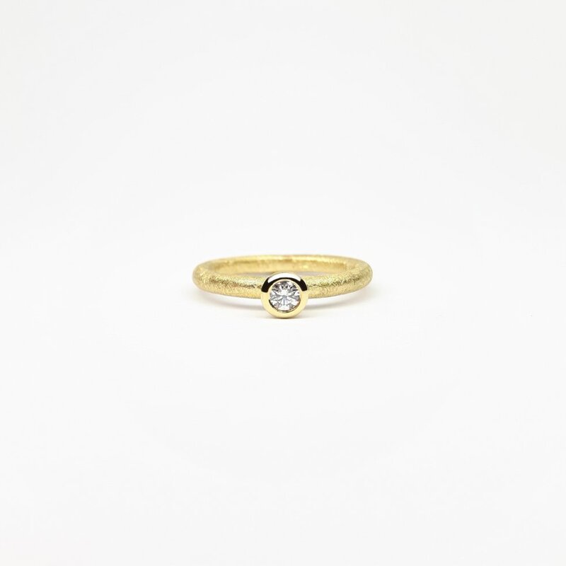 "combiring mini", or jaune 18kt et diamant 0,1ct.