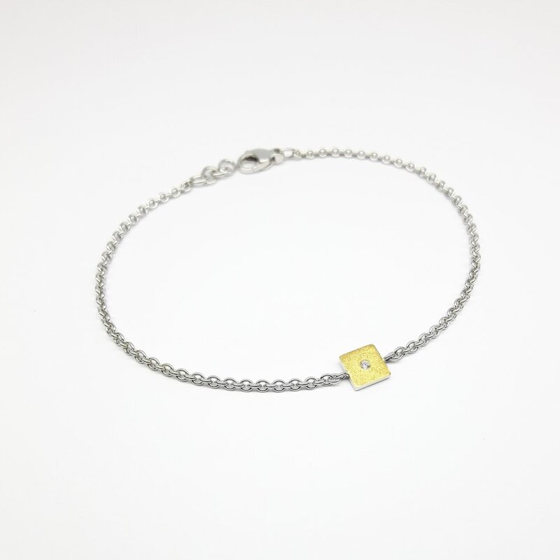 Bracelet en or fin, argent 925/- et brillant.