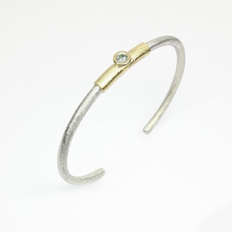 Bracelet en argent 925-., or jaune 18kt et tourmaline verte.