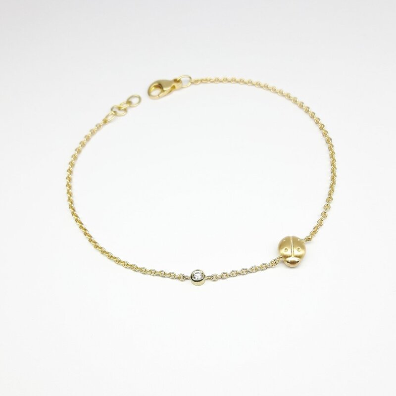 "Ladybug", bracelet en or jaune 18kt et diamant.