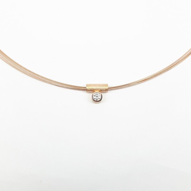 Pendentif en or rouge 18kt et brillant 0,25ct.