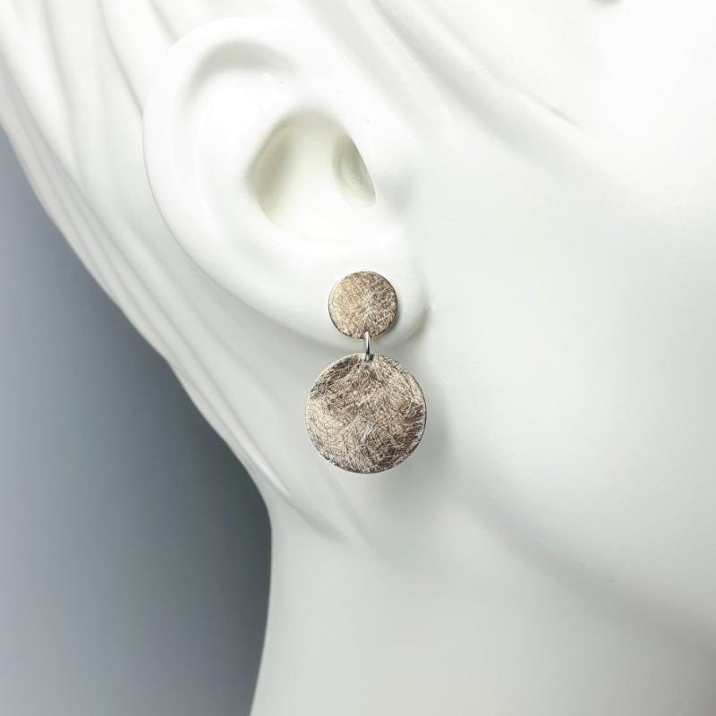 Boucles d'oreilles en or rouge 18kt et argent 925/-.
