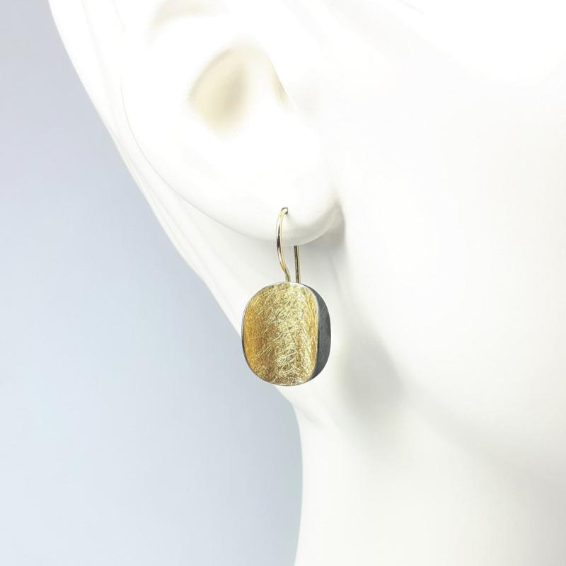 Boucles d'oreilles en argent 925/-, or fin et or jaune 18kt.
