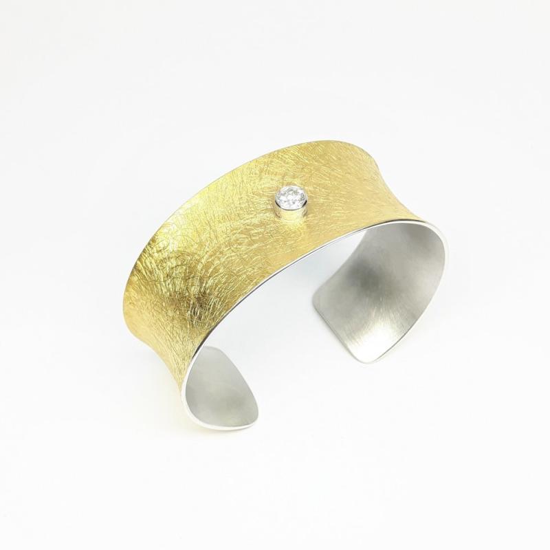 Bracelet en or jaune 22kt, argent et 1brillant. de 0,50ct.