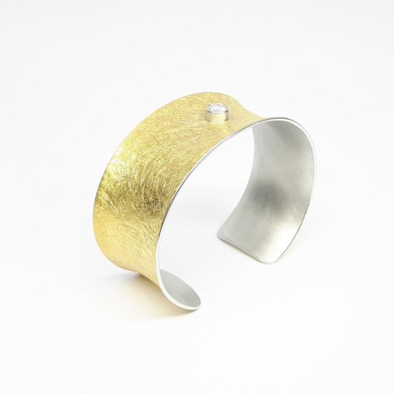 Bracelet en or jaune 22kt, argent et 1brillant. de 0,50ct.