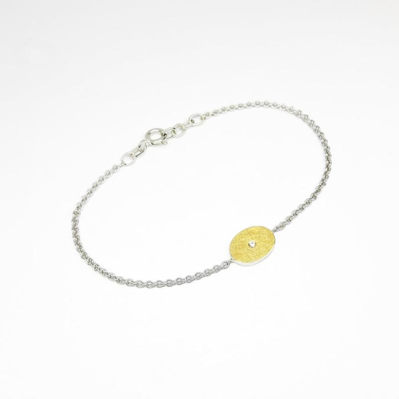 Bracelet en or fin, argent 925/- et brillant.