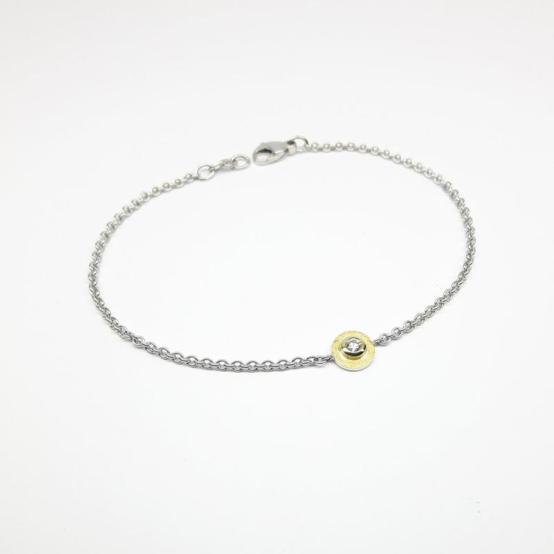 Bracelet en or fin, argent 925/- et brillant.