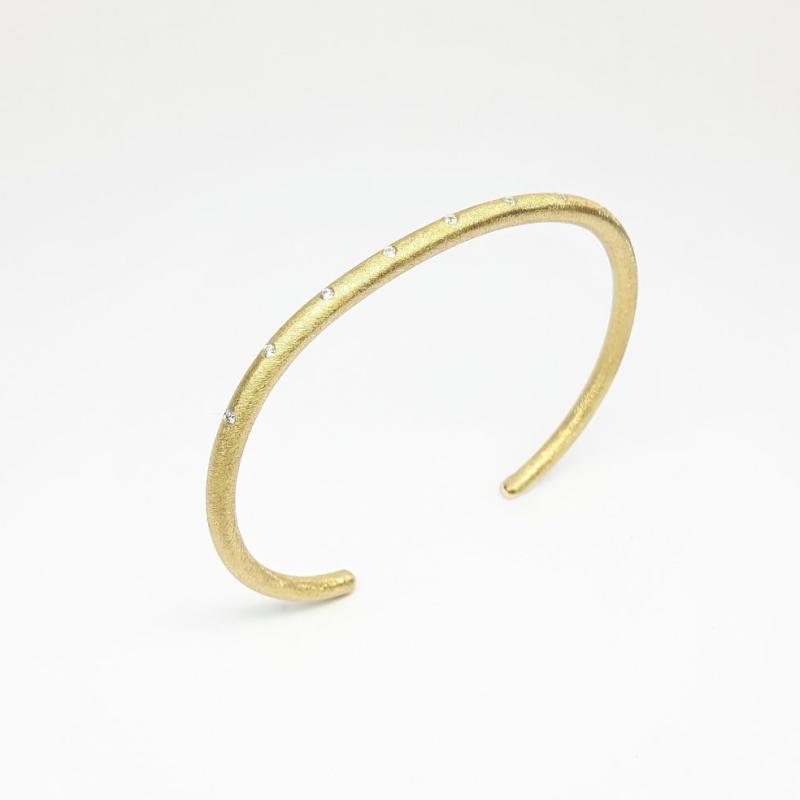 Bracelet en or jaune 18kt et 9 diamants.