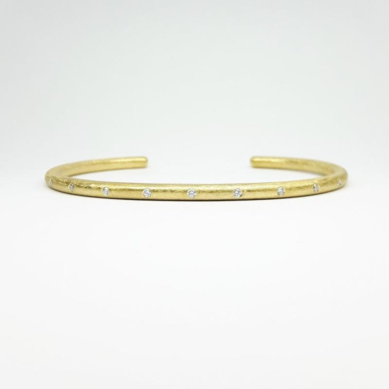 Bracelet en or jaune 18kt et 9 diamants.