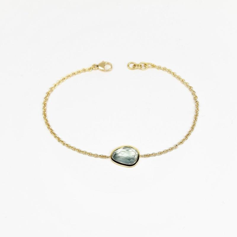 Bracelet en or jaune 18kt et aigue-marine en taille cocktail. Pièce unique.