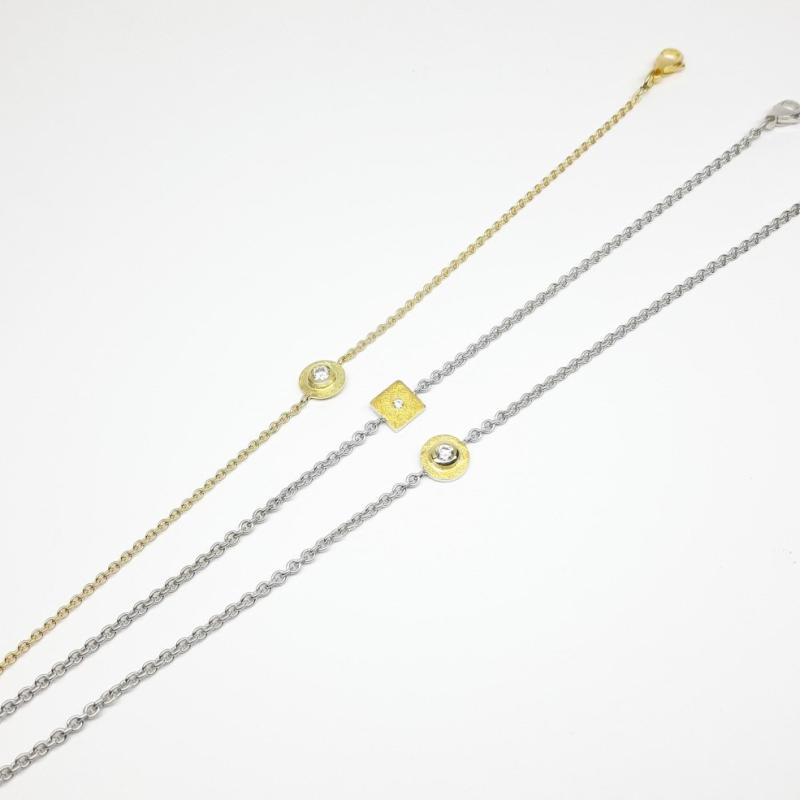 Bracelet en or fin, argent 925/- et brillant.