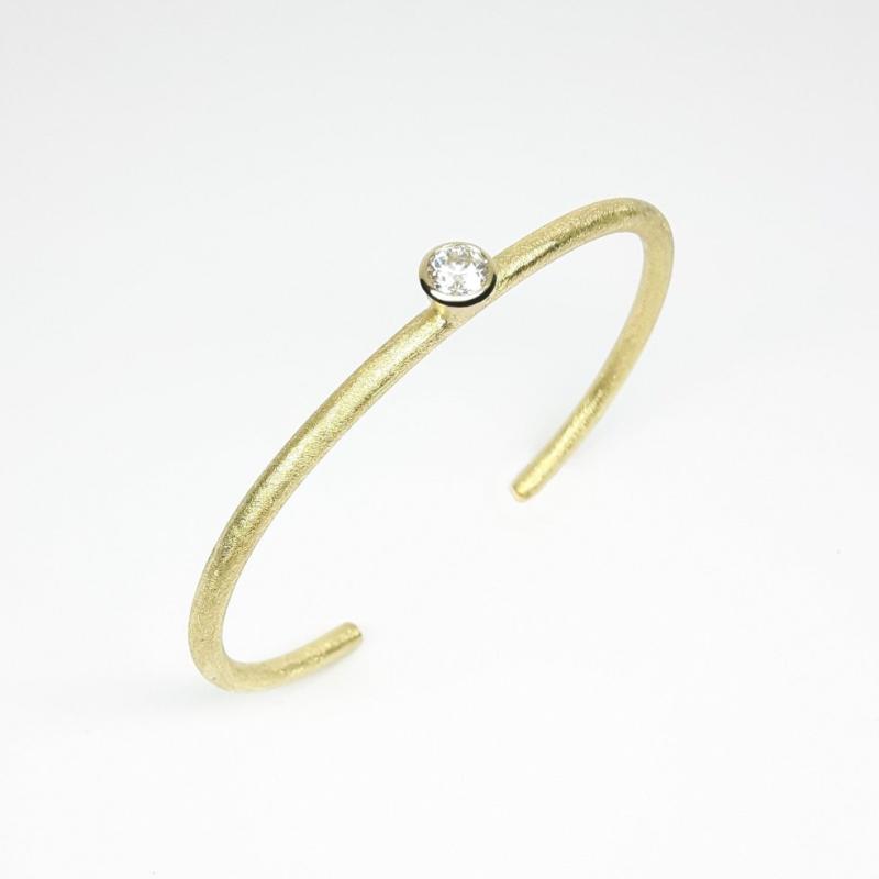 Bracelet en or jaune 18kt et diamant solitaire 0,50ct. Pièce unique.