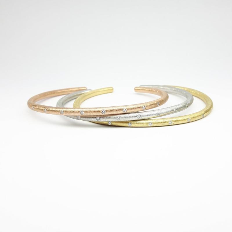 Bracelet en or jaune 18kt et 9 diamants.