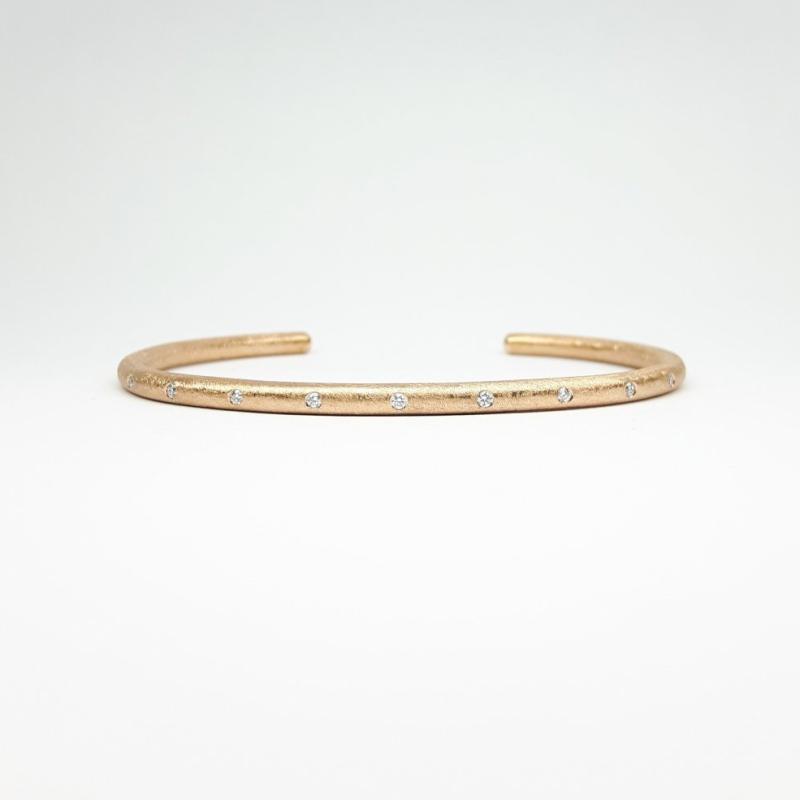 Bracelet en or rouge 18kt et 9 diamants.