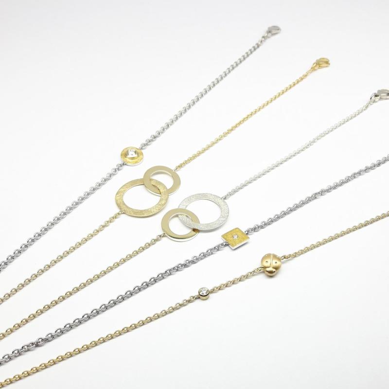 Bracelet en or fin, argent 925/- et brillant.