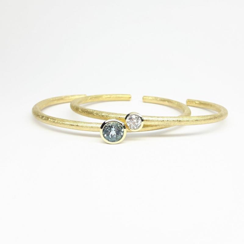 Bracelet en or jaune 18kt et aigue-marine Ø7mm.