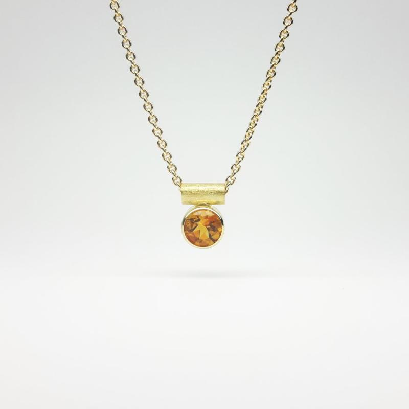 Pendentif en or jaune 18kt et citrine Ø7mm.