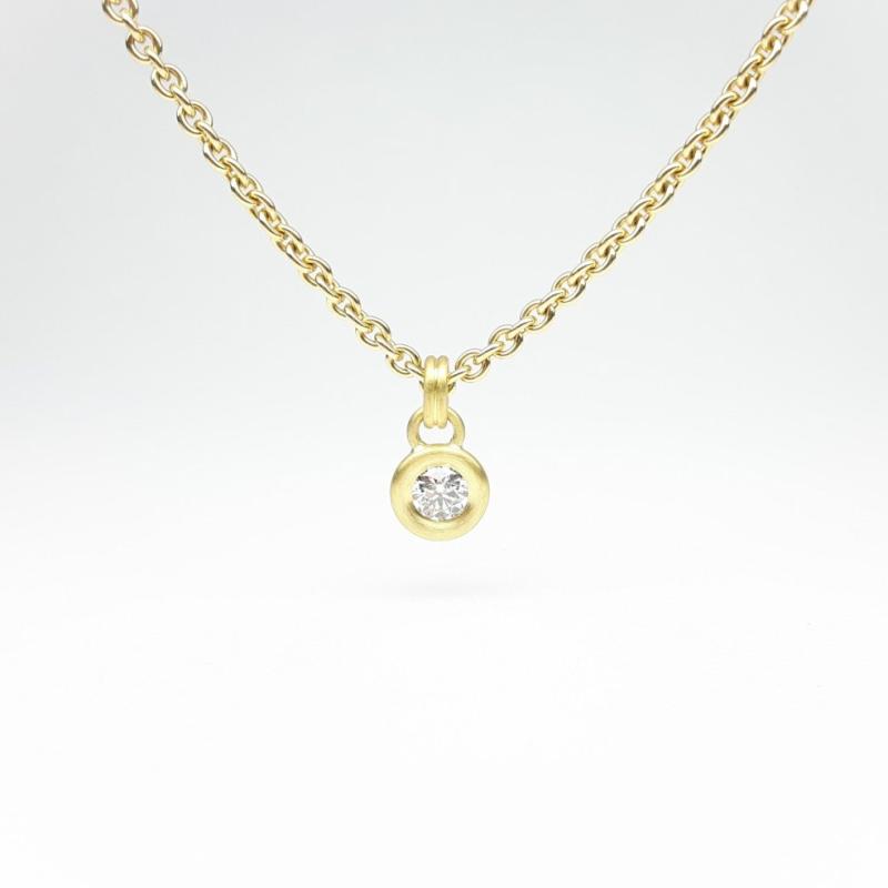 Pendentif en or jaune et brillant Ø4mm 0,25ct.