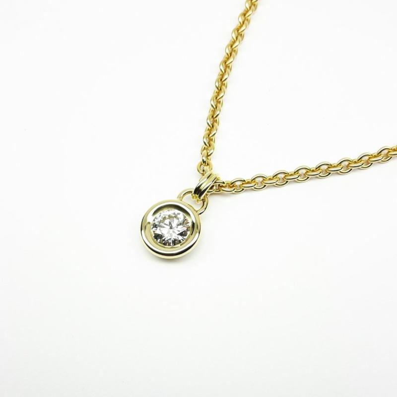 Pendentif en or jaune 18kt et brillant Ø6.09mm 0,84ct.