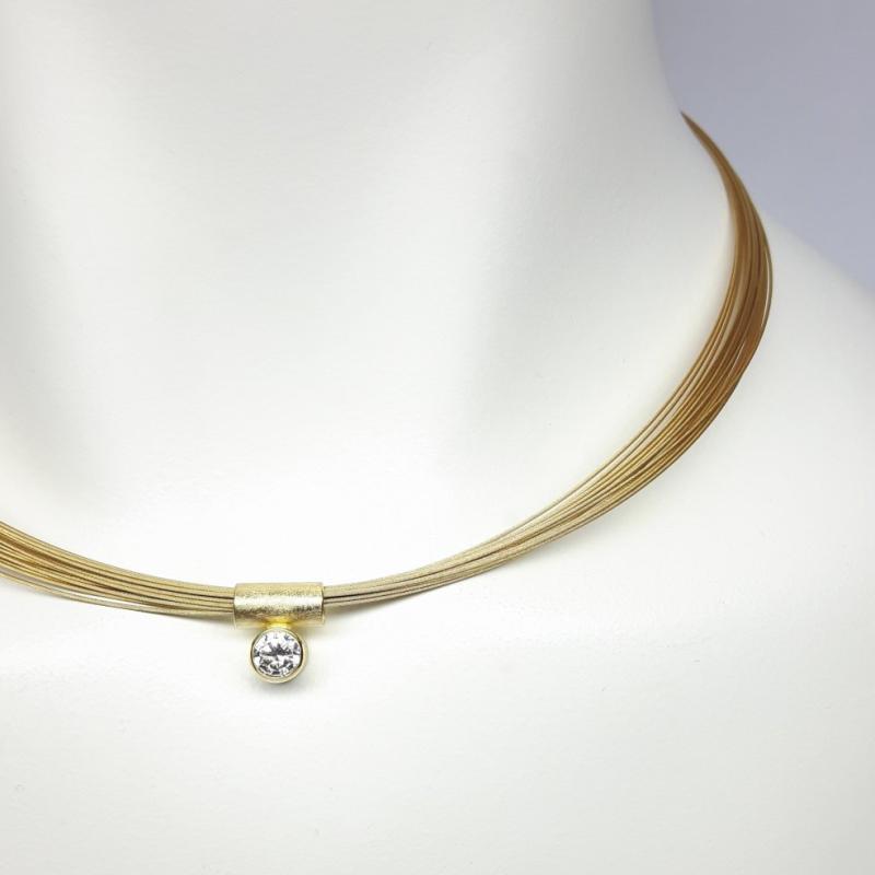 Pendentif en or jaune 18kt et brillant ø5,2mm 0,50ct.