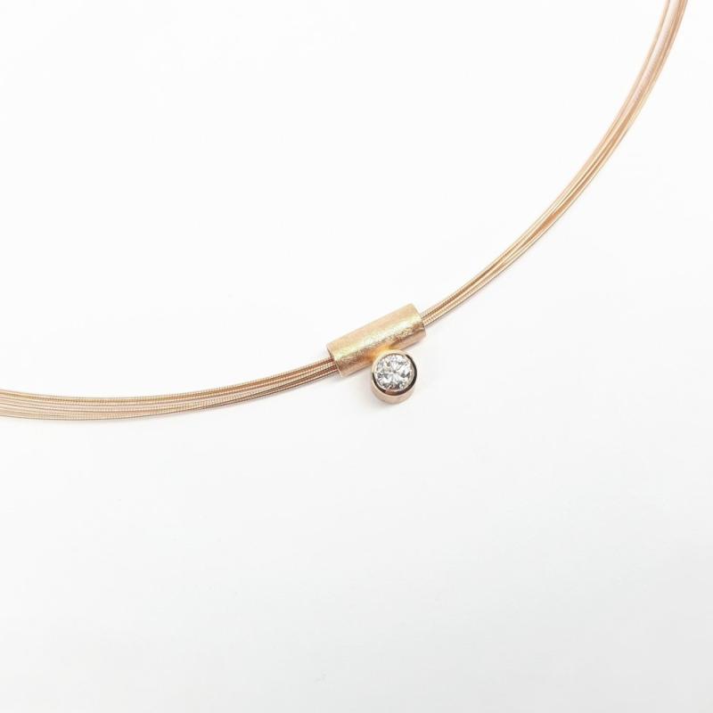 Pendentif en or rouge 18kt et brillant 0,25ct.