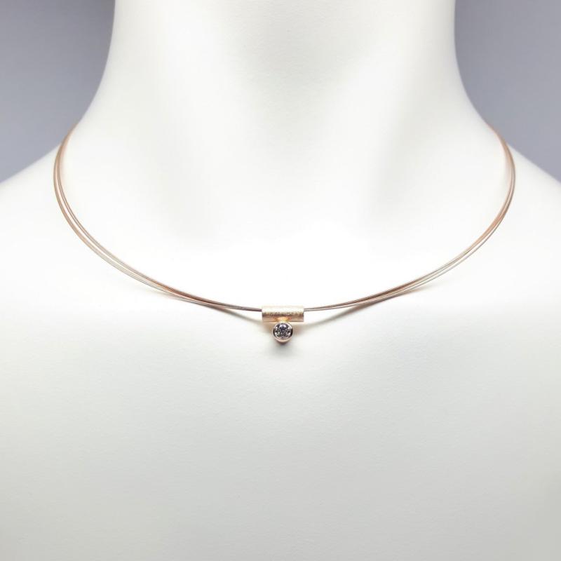 Pendentif en or rouge 18kt et brillant 0,25ct.
