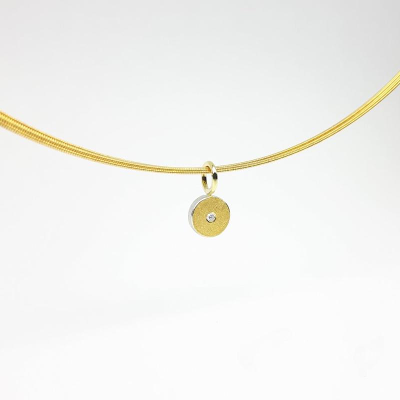 Pendentif en argent 925/-, or fin, or jaune 18kt et diamant.